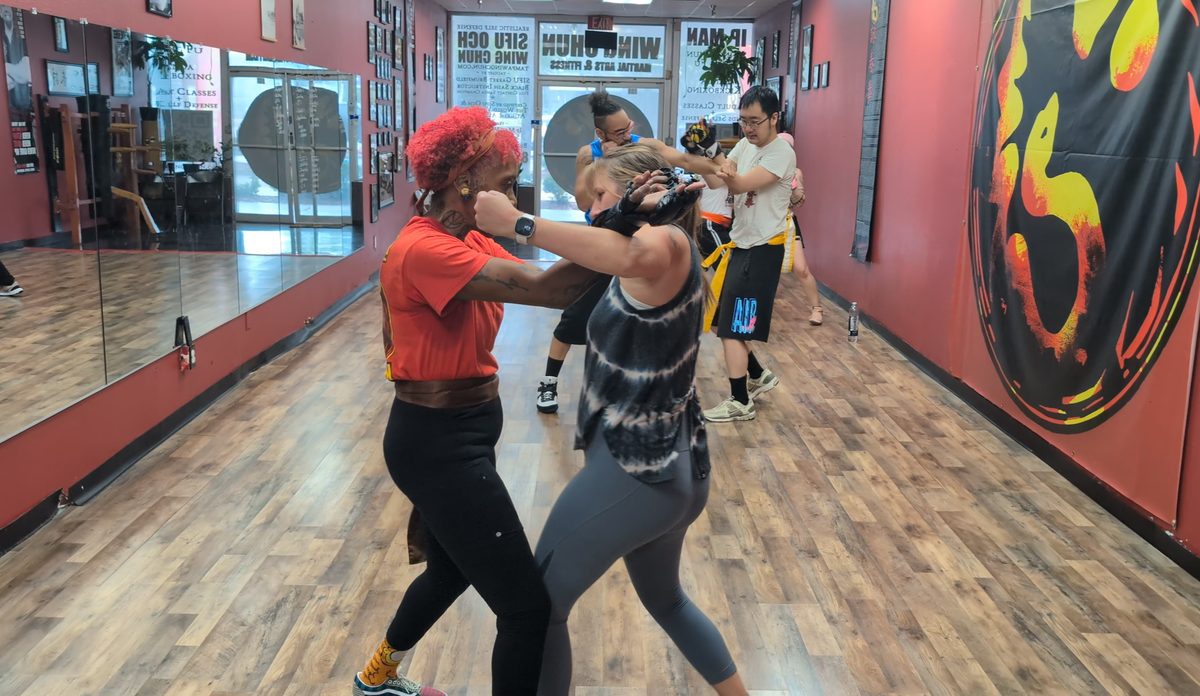 Students training in pairs during a Wing Chun kung fu class at Tampa Wing Chun Kung Fu